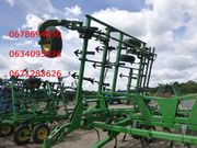 Культиватор John Deere 2210.