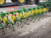 Пропашной культиватор John Deere 825 .